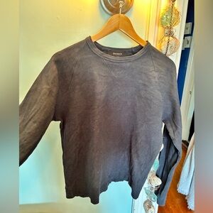 Ransom Charcoal Gray Pullover. Form fitted and length is short.